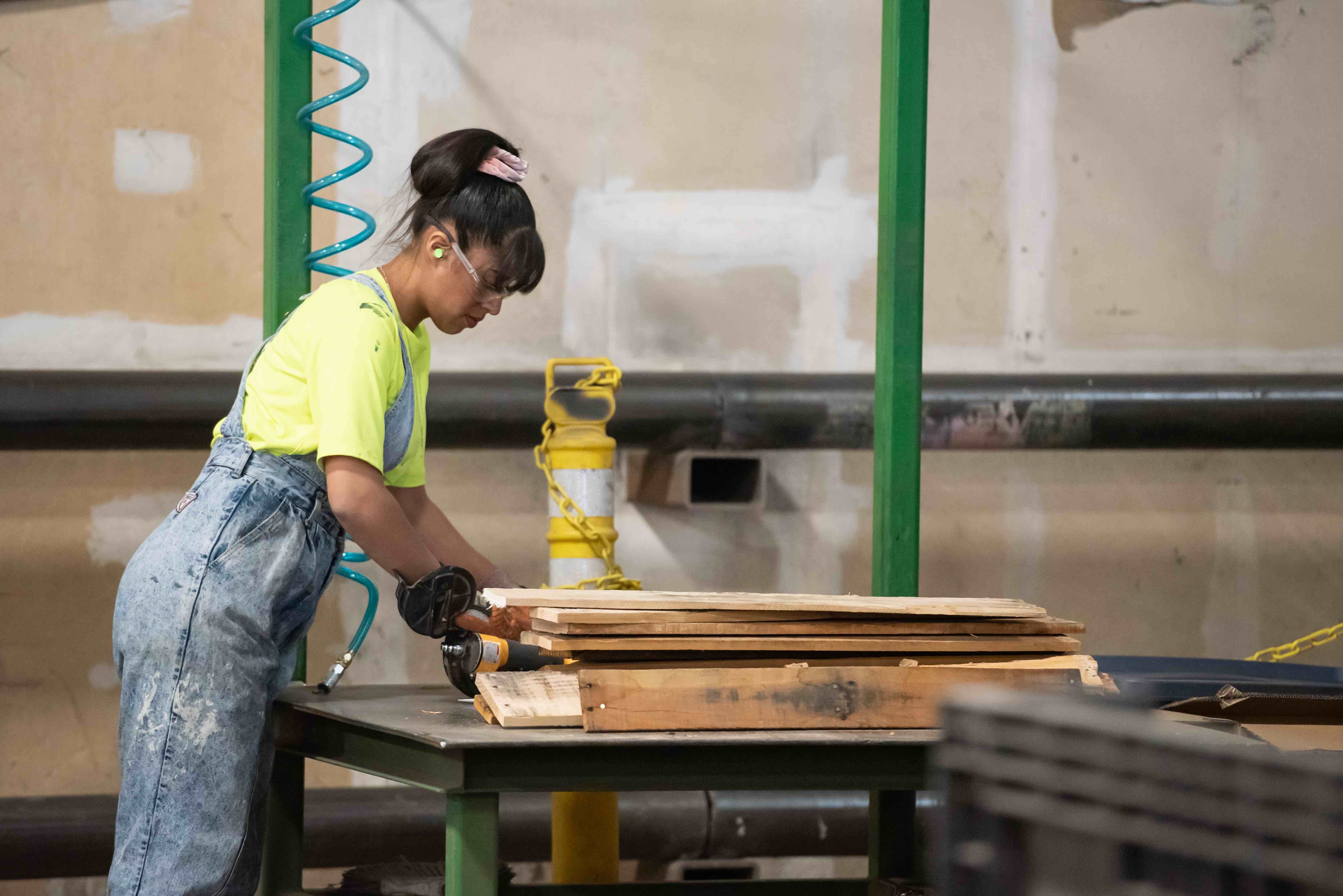 48forty employee working at recycled pallet plant