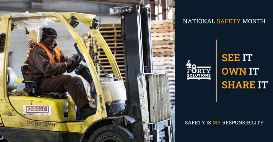 Worker on fork lift moving pallets with See It Own it Share It safety initiative on graphic 